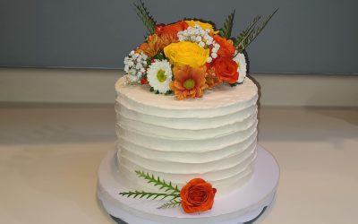 Vanilla Cake With Red Raspberry Preserve With Buttercream Icing