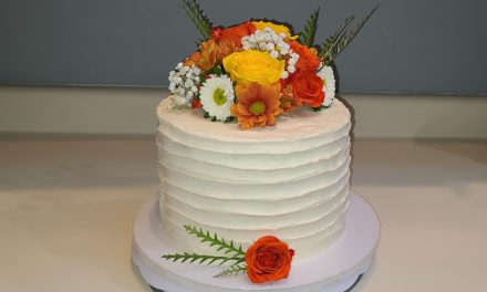 Vanilla Cake With Red Raspberry Preserve With Buttercream Icing